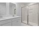 Modern bathroom showcasing double vanity with quartz countertops and a glass-enclosed shower at 212 Terrace View Dr, Summerville, SC 29486