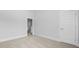Well-lit room with a carpeted floor and white baseboards and doors throughout the home at 212 Terrace View Dr, Summerville, SC 29486