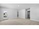 Spacious carpeted bedroom with three door openings, including one to a balcony at 212 Terrace View Dr, Summerville, SC 29486
