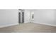 Neutral carpeted bedroom features white baseboards and trim, and large closet at 212 Terrace View Dr, Summerville, SC 29486