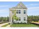 Charming two-story home with a covered porch and attractive landscaping at 212 Terrace View Dr, Summerville, SC 29486