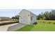 Newly built detached garage on a property with a well-maintained lawn at 212 Terrace View Dr, Summerville, SC 29486