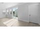 Bright living room with lots of natural light from windows and glass sliding doors to the outdoor area at 212 Terrace View Dr, Summerville, SC 29486