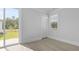 Well-lit room with a sliding glass door and a window that brighten the interior at 212 Terrace View Dr, Summerville, SC 29486
