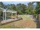 Backyard area featuring a wooden deck and stone walkway at 214 Deer Ridge Court Ct, Huger, SC 29450
