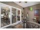 Enclosed patio featuring ceiling fan with views to interior rooms at 214 Deer Ridge Court Ct, Huger, SC 29450