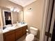 Bathroom featuring a vanity with storage, a round sink, and a toilet at 2206 Hunter Creek Dr, Charleston, SC 29414