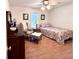 Cozy bedroom featuring an armchair, dresser, and twin bed with floral bedding near a window at 2206 Hunter Creek Dr, Charleston, SC 29414