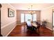 Formal dining room featuring hardwood floors, large window, and traditional furnishings at 2206 Hunter Creek Dr, Charleston, SC 29414