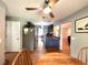 Bright kitchen overlooking the dining area, featuring a breakfast bar and stainless steel refrigerator at 2206 Hunter Creek Dr, Charleston, SC 29414