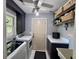Functional laundry room with modern appliances, storage cabinets, and easy access to the outdoors at 2206 Hunter Creek Dr, Charleston, SC 29414
