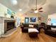 Spacious living room featuring hardwood floors, a fireplace, and comfortable furnishings at 2206 Hunter Creek Dr, Charleston, SC 29414