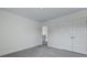 Clean bedroom with neutral gray carpet, white trim and double door closet, perfect for any style at 222 Terrace View Dr, Summerville, SC 29486