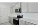 Modern kitchen featuring stainless steel appliances and stylish gray cabinetry at 222 Terrace View Dr, Summerville, SC 29486