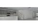Open kitchen with a breakfast bar and modern appliances next to the stairway at 222 Terrace View Dr, Summerville, SC 29486