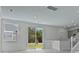 Bright living room with sliding glass doors and a view of the backyard at 222 Terrace View Dr, Summerville, SC 29486