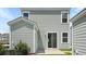 Back of home featuring light siding, patio, and sliding glass door at 222 Terrace View Dr, Summerville, SC 29486