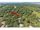 Aerial view showcases golf course and lush surrounding foliage, enhancing the propertys appeal at 2340 Marsh Hen Dr, Seabrook Island, SC 29455