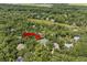 Aerial view of home surrounded by trees in a serene neighborhood, promising privacy at 2340 Marsh Hen Dr, Seabrook Island, SC 29455