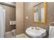 Bathroom with patterned wallpaper, pedestal sink, and shower at 2340 Marsh Hen Dr, Seabrook Island, SC 29455