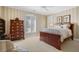 Cozy bedroom featuring a wooden dresser and striped wallpaper at 2340 Marsh Hen Dr, Seabrook Island, SC 29455