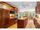 Gourmet kitchen featuring wooden cabinetry, stainless appliances, granite countertop island at 2340 Marsh Hen Dr, Seabrook Island, SC 29455