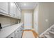 Laundry room with counter space, sink and white cabinets at 2340 Marsh Hen Dr, Seabrook Island, SC 29455