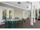 Covered patio with comfortable seating area, perfect for enjoying the outdoors with plants and views at 2340 Marsh Hen Dr, Seabrook Island, SC 29455