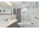 Modern bathroom with sleek vanity, decorative tile, and shower with curtain at 2407 Cameron Blvd, Isle of Palms, SC 29451