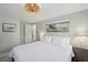Bright bedroom features a cozy king bed and beach-themed decor at 2407 Cameron Blvd, Isle of Palms, SC 29451