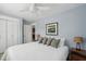 Charming bedroom with ceiling fan, hardwood floors, and stylish decor at 2407 Cameron Blvd, Isle of Palms, SC 29451