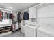 Well-organized walk-in closet and laundry area at 2407 Cameron Blvd, Isle of Palms, SC 29451
