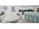 Bright kitchen and dining area, with stainless steel appliances, and a breakfast bar at 2407 Cameron Blvd, Isle of Palms, SC 29451