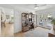 Bright home office featuring custom shelving, a desk, and beautiful natural light at 2407 Cameron Blvd, Isle of Palms, SC 29451