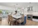Spacious open kitchen with a large island, stainless steel appliances, and a seamless flow to the living area at 2407 Cameron Blvd, Isle of Palms, SC 29451