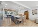 Bright kitchen with a large island, modern appliances, and a seamless transition to the dining area at 2407 Cameron Blvd, Isle of Palms, SC 29451