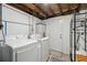 Practical laundry area with side by side washer and dryer, and white painted block walls at 2407 Cameron Blvd, Isle of Palms, SC 29451