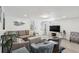 Cozy living room with a comfortable sofa, accent chairs, and a modern TV at 2407 Cameron Blvd, Isle of Palms, SC 29451