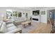 Contemporary living space with a fireplace, TV, and an open layout perfect for entertaining at 2407 Cameron Blvd, Isle of Palms, SC 29451