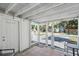 Inviting screened porch with views of the neighborhood at 2407 Cameron Blvd, Isle of Palms, SC 29451