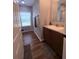 Well-lit bathroom featuring a vanity with a granite countertop at 2460 Bama Rd, Cottageville, SC 29435