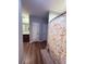 Clean bathroom featuring a granite double sink and views of the shower with decorated shower curtain at 2460 Bama Rd, Cottageville, SC 29435
