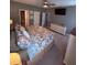 Relaxing bedroom featuring a queen-sized bed, dresser, ceiling fan, and neutral colored carpet at 2460 Bama Rd, Cottageville, SC 29435
