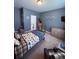 Cozy bedroom featuring playful decor, dresser and comfortable furnishings at 2460 Bama Rd, Cottageville, SC 29435