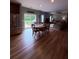 Open kitchen with a sliding glass door and dining set at 2460 Bama Rd, Cottageville, SC 29435