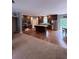 Spacious kitchen features wood cabinets, stainless appliances, and a center island with barstool seating at 2460 Bama Rd, Cottageville, SC 29435