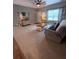 Comfortable living room with neutral tones, ceiling fan and natural light at 2460 Bama Rd, Cottageville, SC 29435