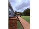 Ramp leading to a deck with comfortable seating and serene backyard views at 2460 Bama Rd, Cottageville, SC 29435