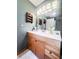 Stylish bathroom featuring a spacious vanity with good lighting, drawers and cabinet storage at 24678 Augusta Hwy, Cottageville, SC 29435