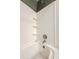 Modern bathtub with tile surround, chrome faucet and shower head and built in shelves for storage and decor at 24678 Augusta Hwy, Cottageville, SC 29435